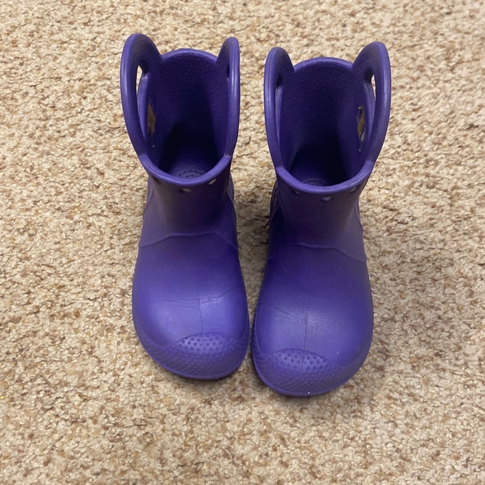 Crocs handle it purple rain boots